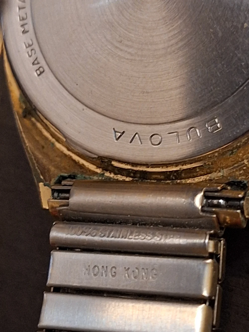 Bulova Gold and White Dress Watch with Roman Numerals‎